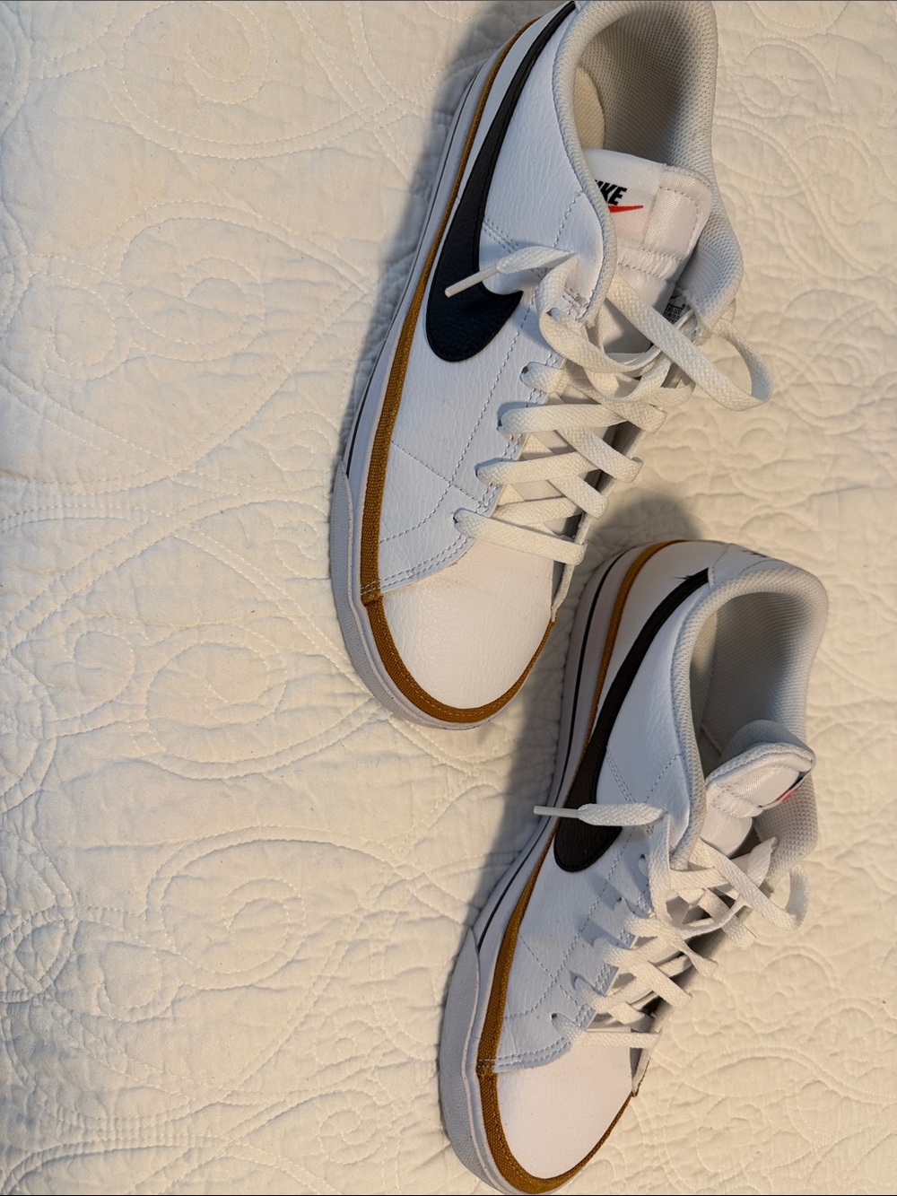 Nike White Sneakers with Black Swoosh and Brown Trim